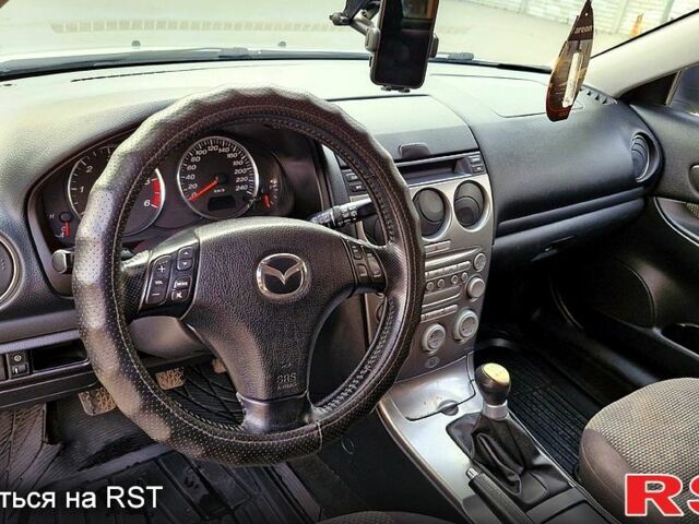 Сірий Мазда 6, об'ємом двигуна 2 л та пробігом 302 тис. км за 3000 $, фото 12 на Automoto.ua