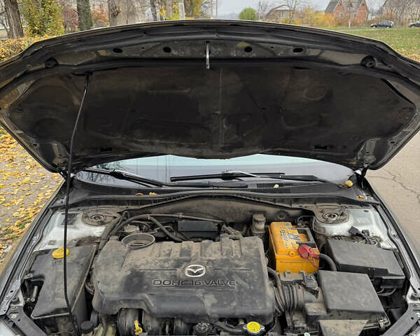 Серый Мазда 6, объемом двигателя 2 л и пробегом 243 тыс. км за 4200 $, фото 12 на Automoto.ua