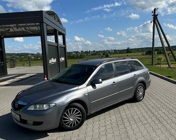 Серый Мазда 6, объемом двигателя 2 л и пробегом 280 тыс. км за 2550 $, фото 6 на Automoto.ua