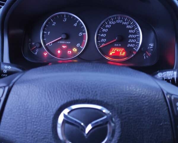 Серый Мазда 6, объемом двигателя 2 л и пробегом 337 тыс. км за 3700 $, фото 10 на Automoto.ua