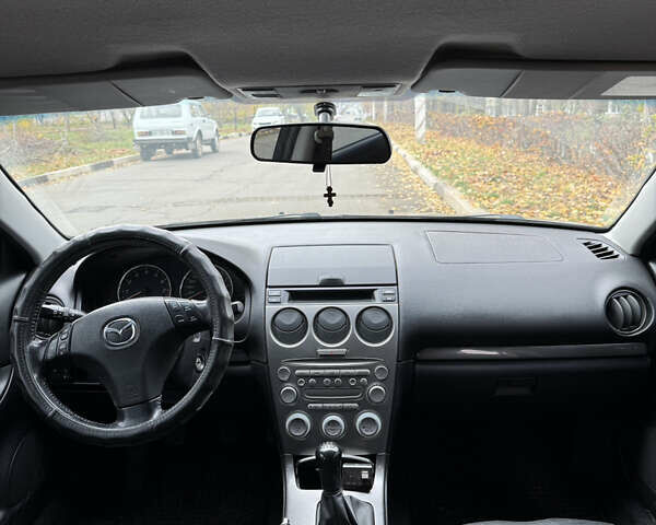 Серый Мазда 6, объемом двигателя 2 л и пробегом 243 тыс. км за 4200 $, фото 7 на Automoto.ua