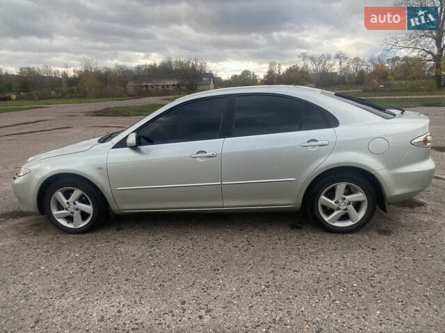 Серый Мазда 6, объемом двигателя 2 л и пробегом 251 тыс. км за 6100 $, фото 8 на Automoto.ua