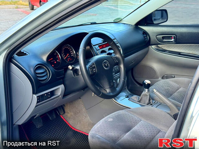 Серый Мазда 6, объемом двигателя 1.8 л и пробегом 246 тыс. км за 3500 $, фото 7 на Automoto.ua