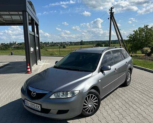 Серый Мазда 6, объемом двигателя 2 л и пробегом 280 тыс. км за 2550 $, фото 7 на Automoto.ua