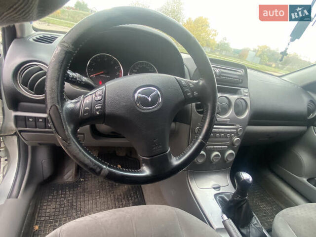 Серый Мазда 6, объемом двигателя 2 л и пробегом 251 тыс. км за 6100 $, фото 24 на Automoto.ua