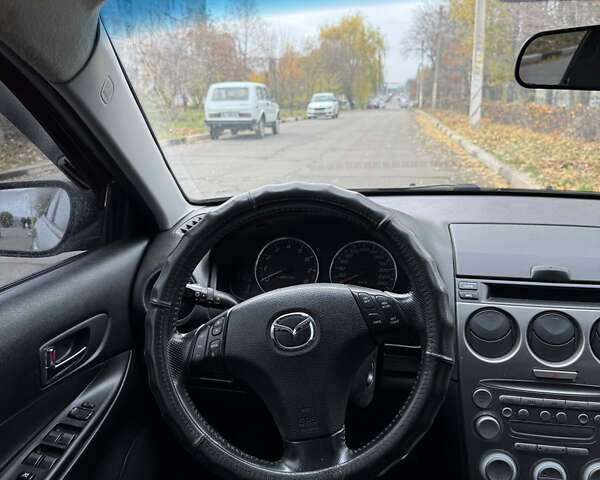 Серый Мазда 6, объемом двигателя 2 л и пробегом 243 тыс. км за 4200 $, фото 8 на Automoto.ua