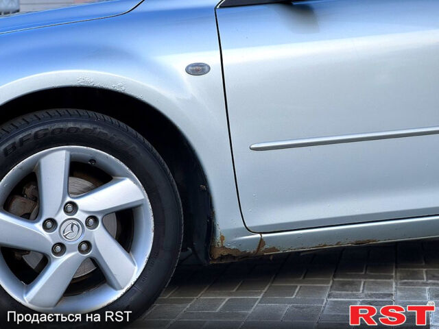 Серый Мазда 6, объемом двигателя 1.8 л и пробегом 246 тыс. км за 3500 $, фото 12 на Automoto.ua