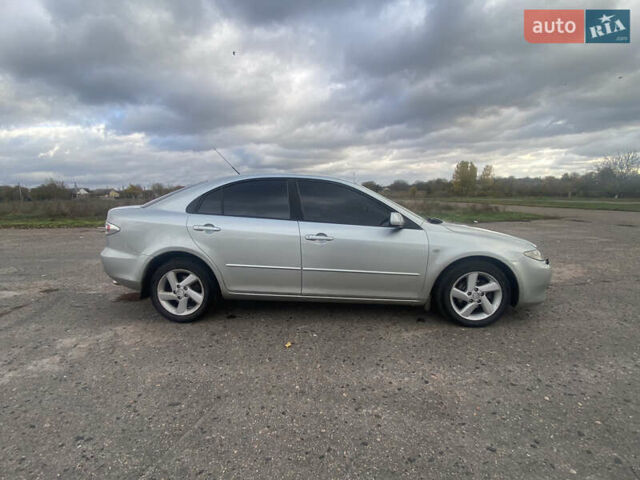 Серый Мазда 6, объемом двигателя 2 л и пробегом 251 тыс. км за 6100 $, фото 3 на Automoto.ua