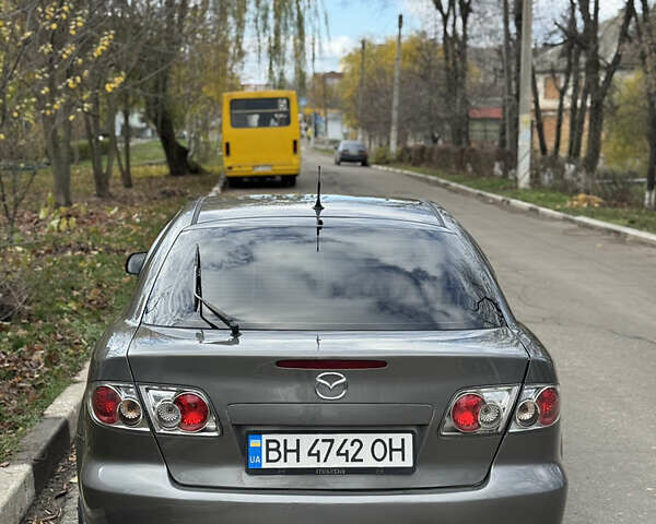 Серый Мазда 6, объемом двигателя 2 л и пробегом 243 тыс. км за 4200 $, фото 4 на Automoto.ua
