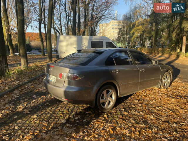 Серый Мазда 6, объемом двигателя 2 л и пробегом 290 тыс. км за 4900 $, фото 2 на Automoto.ua