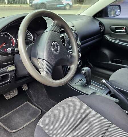 Сірий Мазда 6, об'ємом двигуна 2 л та пробігом 264 тис. км за 4900 $, фото 5 на Automoto.ua