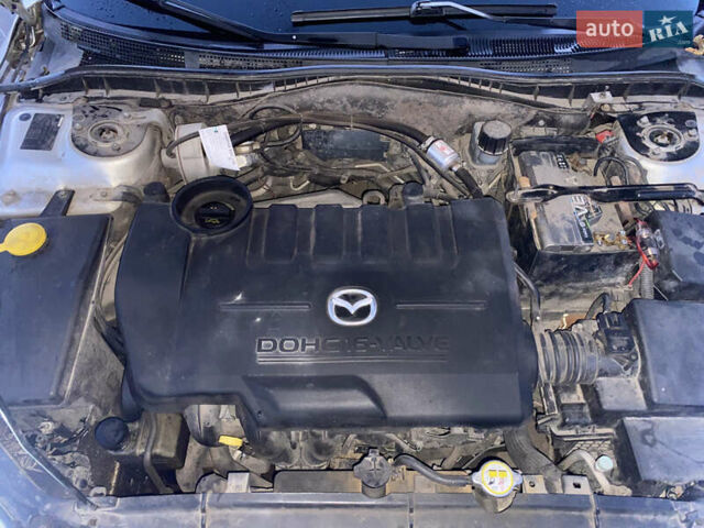 Мазда 6 2004 в Хмельницком на Automoto.ua Серый Мазда 6, объемом двигателя 2 л и пробегом 285 тыс. км за 3550 $, фото 12 на Automoto.ua