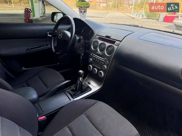Серый Мазда 6, объемом двигателя 2 л и пробегом 289 тыс. км за 4350 $, фото 9 на Automoto.ua