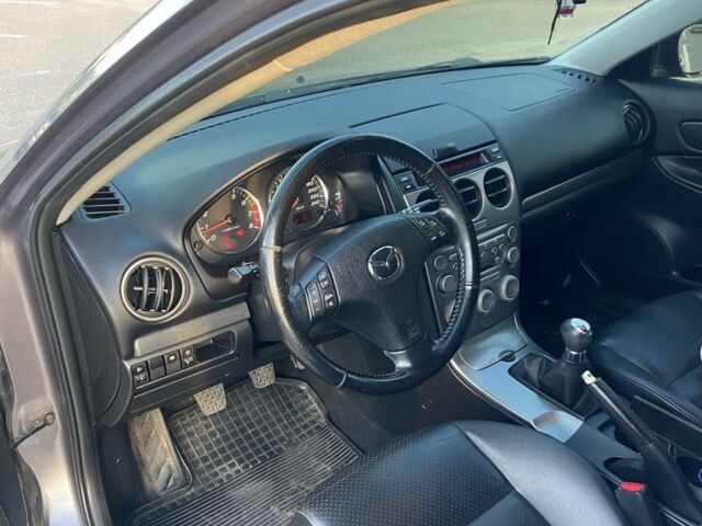 Серый Мазда 6, объемом двигателя 1.8 л и пробегом 219 тыс. км за 3999 $, фото 1 на Automoto.ua