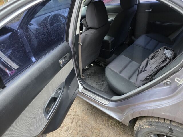 Мазда 6 2004 в Черкассах на Automoto.ua Серый Мазда 6, объемом двигателя 2 л и пробегом 406 тыс. км за 3800 $, фото 5 на Automoto.ua