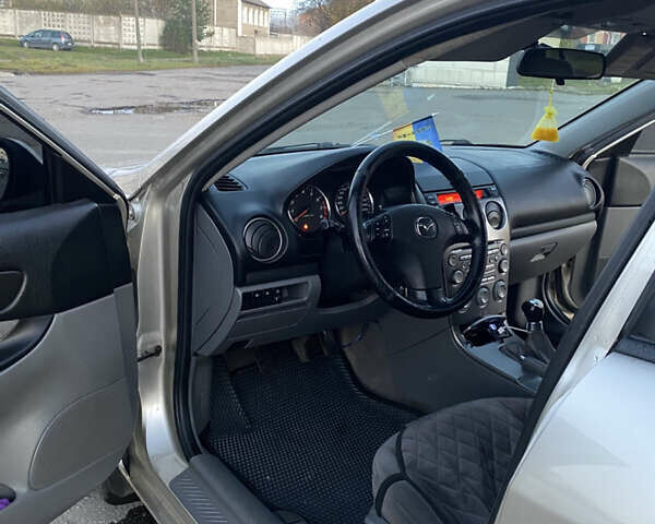 Мазда 6 2004 в Хмельницком на Automoto.ua Серый Мазда 6, объемом двигателя 2 л и пробегом 285 тыс. км за 3550 $, фото 9 на Automoto.ua