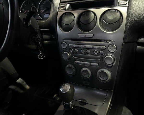 Сірий Мазда 6, об'ємом двигуна 2 л та пробігом 210 тис. км за 2600 $, фото 7 на Automoto.ua