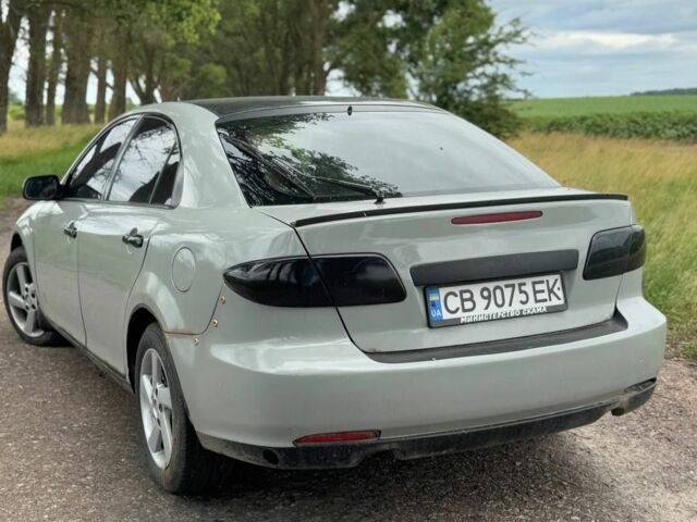 Серый Мазда 6, объемом двигателя 2 л и пробегом 240 тыс. км за 4500 $, фото 2 на Automoto.ua