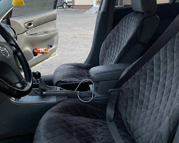 Мазда 6 2004 в Хмельницком на Automoto.ua Серый Мазда 6, объемом двигателя 2 л и пробегом 285 тыс. км за 3550 $, фото 10 на Automoto.ua