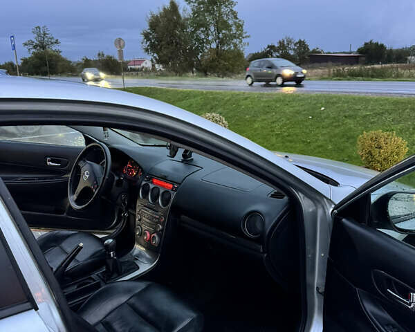 Сірий Мазда 6, об'ємом двигуна 2 л та пробігом 210 тис. км за 2600 $, фото 4 на Automoto.ua