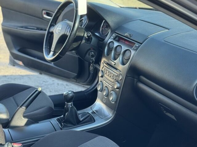 Серый Мазда 6, объемом двигателя 2 л и пробегом 327 тыс. км за 4500 $, фото 7 на Automoto.ua