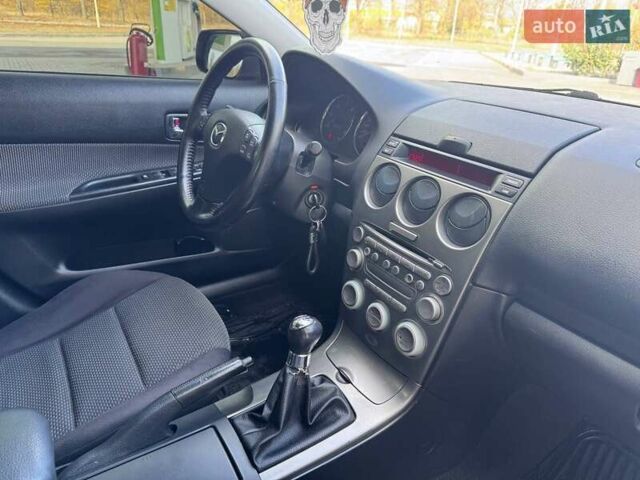 Серый Мазда 6, объемом двигателя 2 л и пробегом 289 тыс. км за 4350 $, фото 11 на Automoto.ua