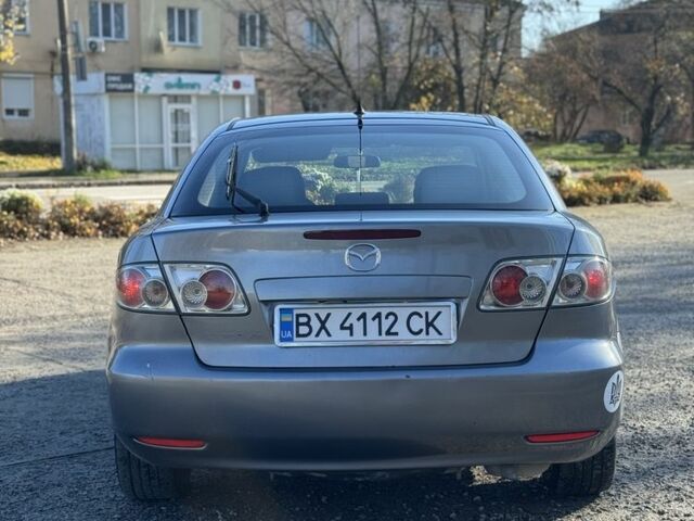 Серый Мазда 6, объемом двигателя 2 л и пробегом 327 тыс. км за 4500 $, фото 2 на Automoto.ua