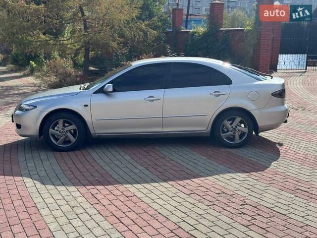 Серый Мазда 6, объемом двигателя 2 л и пробегом 289 тыс. км за 4350 $, фото 5 на Automoto.ua