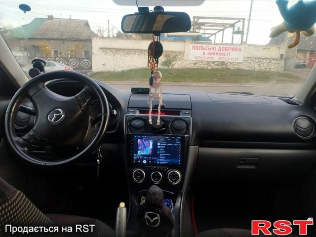 Мазда 6 2005 у Первомайськ на Automoto.ua Сірий Мазда 6, об'ємом двигуна 2 л та пробігом 371 тис. км за 4800 $, фото 9 на Automoto.ua