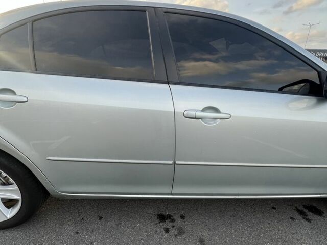 Серый Мазда 6, объемом двигателя 1.8 л и пробегом 232 тыс. км за 6700 $, фото 5 на Automoto.ua