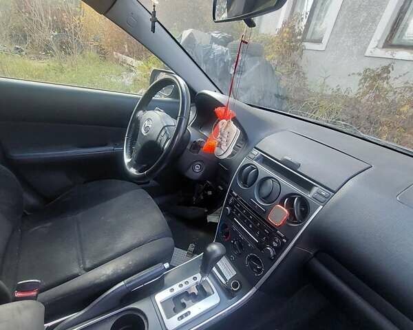 Серый Мазда 6, объемом двигателя 2.26 л и пробегом 233 тыс. км за 2300 $, фото 3 на Automoto.ua