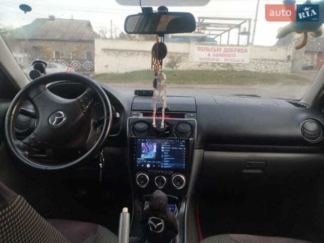 Мазда 6 2005 у Первомайськ на Automoto.ua Сірий Мазда 6, об'ємом двигуна 2 л та пробігом 371 тис. км за 4800 $, фото 11 на Automoto.ua