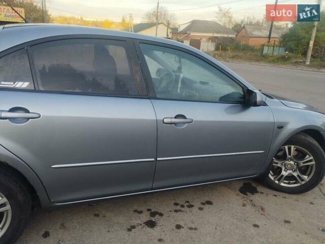 Мазда 6 2005 у Первомайськ на Automoto.ua Сірий Мазда 6, об'ємом двигуна 2 л та пробігом 371 тис. км за 4800 $, фото 3 на Automoto.ua