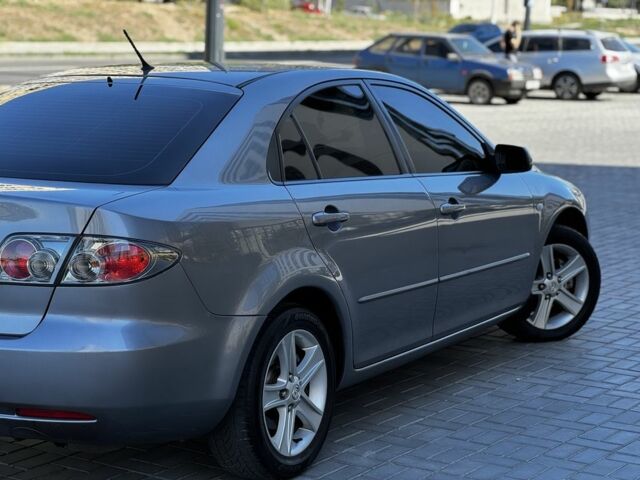 Серый Мазда 6, объемом двигателя 1.8 л и пробегом 165 тыс. км за 4300 $, фото 1 на Automoto.ua