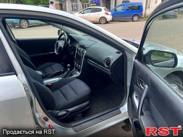 Сірий Мазда 6, об'ємом двигуна 2 л та пробігом 241 тис. км за 3250 $, фото 8 на Automoto.ua