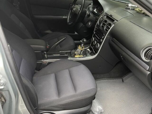 Серый Мазда 6, объемом двигателя 2 л и пробегом 225 тыс. км за 5600 $, фото 2 на Automoto.ua
