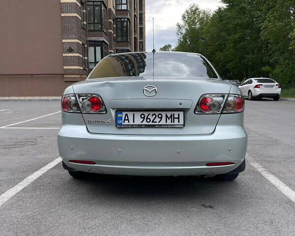 Серый Мазда 6, объемом двигателя 1.8 л и пробегом 312 тыс. км за 4000 $, фото 5 на Automoto.ua
