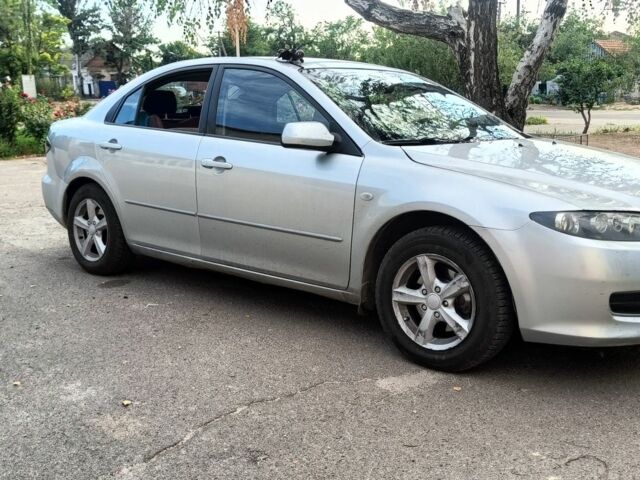 Серый Мазда 6, объемом двигателя 2 л и пробегом 245 тыс. км за 3400 $, фото 7 на Automoto.ua