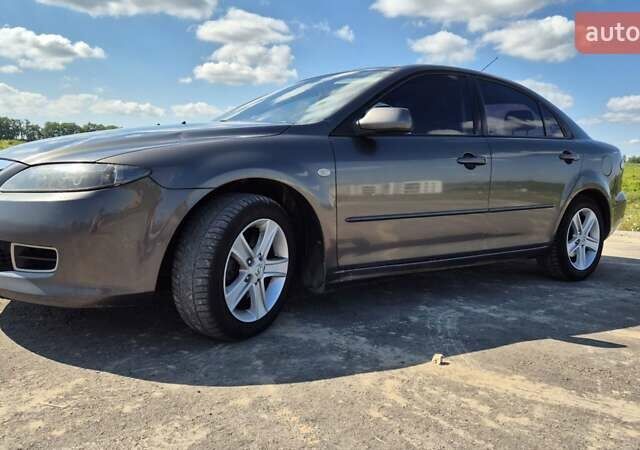 Сірий Мазда 6, об'ємом двигуна 2 л та пробігом 435 тис. км за 4300 $, фото 13 на Automoto.ua