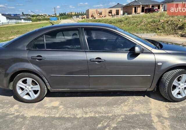 Сірий Мазда 6, об'ємом двигуна 2 л та пробігом 435 тис. км за 4300 $, фото 11 на Automoto.ua