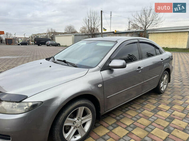 Серый Мазда 6, объемом двигателя 2 л и пробегом 170 тыс. км за 6100 $, фото 1 на Automoto.ua