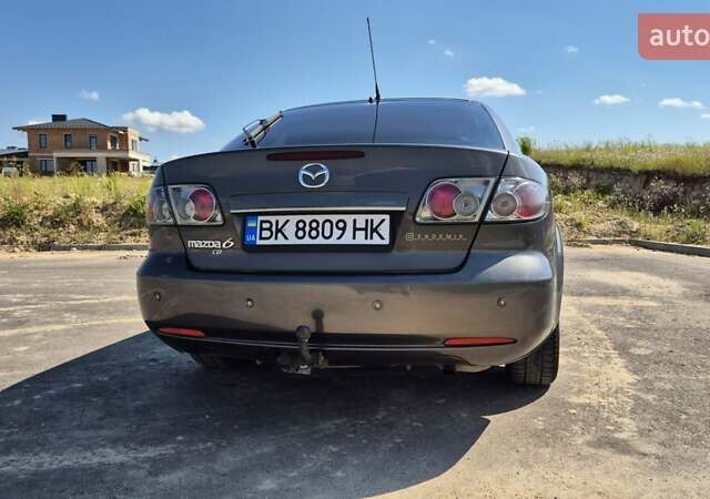Сірий Мазда 6, об'ємом двигуна 2 л та пробігом 435 тис. км за 4300 $, фото 1 на Automoto.ua