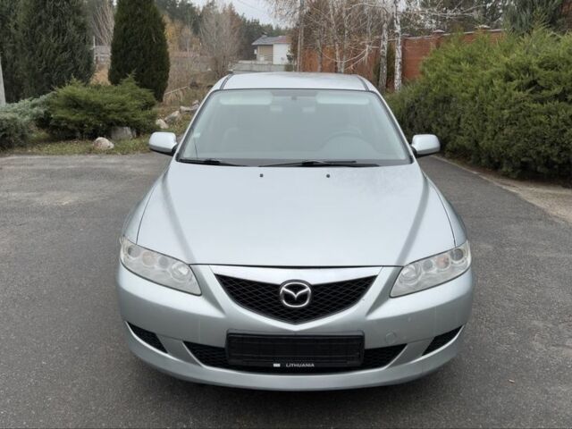 Серый Мазда 6, объемом двигателя 1.8 л и пробегом 249 тыс. км за 3190 $, фото 1 на Automoto.ua