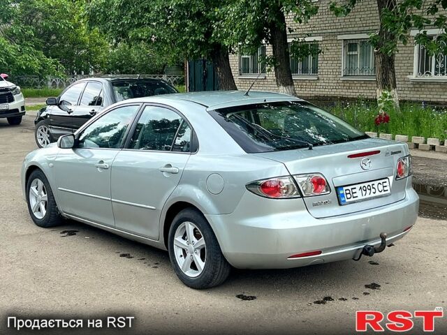Сірий Мазда 6, об'ємом двигуна 2 л та пробігом 241 тис. км за 3250 $, фото 2 на Automoto.ua