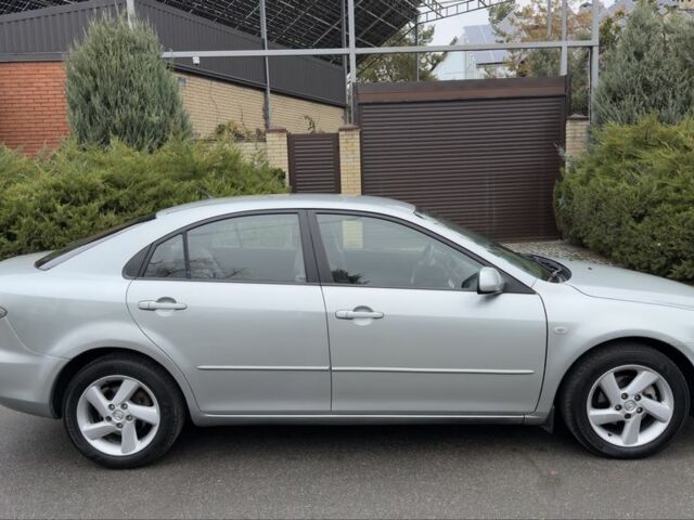 Серый Мазда 6, объемом двигателя 1.8 л и пробегом 249 тыс. км за 3190 $, фото 3 на Automoto.ua