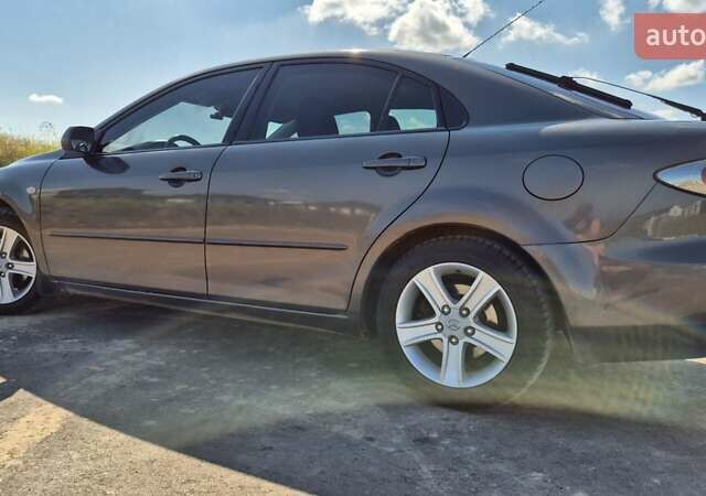 Сірий Мазда 6, об'ємом двигуна 2 л та пробігом 435 тис. км за 4300 $, фото 22 на Automoto.ua