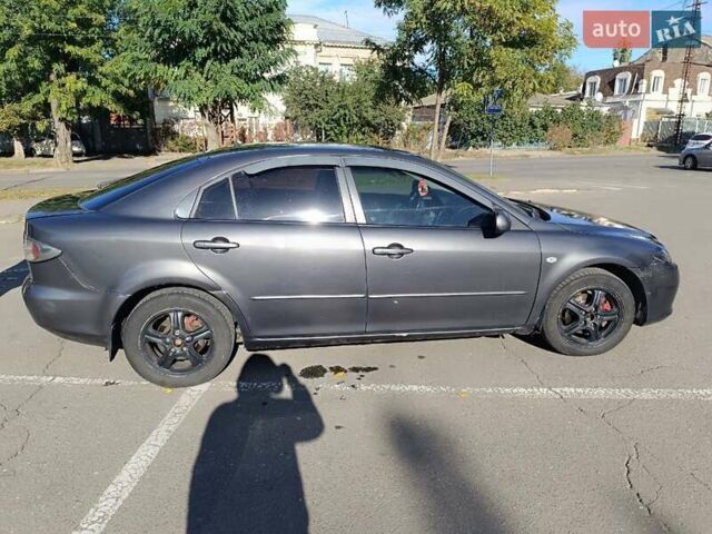 Серый Мазда 6, объемом двигателя 2 л и пробегом 369 тыс. км за 4150 $, фото 1 на Automoto.ua