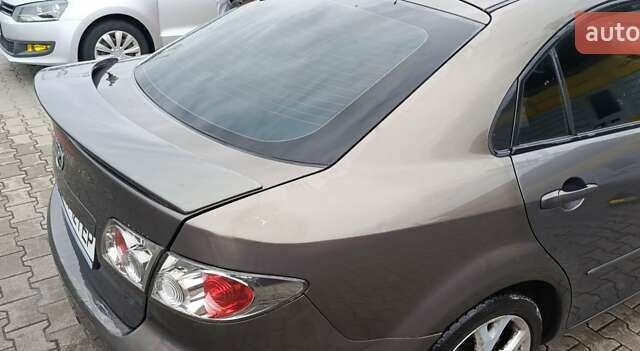 Серый Мазда 6, объемом двигателя 2 л и пробегом 194 тыс. км за 3300 $, фото 10 на Automoto.ua