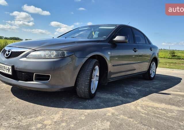 Сірий Мазда 6, об'ємом двигуна 2 л та пробігом 435 тис. км за 4300 $, фото 4 на Automoto.ua