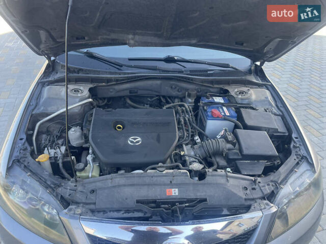 Серый Мазда 6, объемом двигателя 2 л и пробегом 168 тыс. км за 6200 $, фото 28 на Automoto.ua